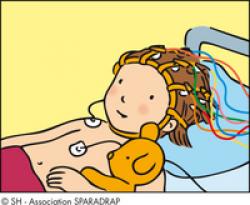 Enfant avec des électrodes sur le corps