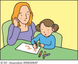 Un orthophoniste avec un enfant qui écrit