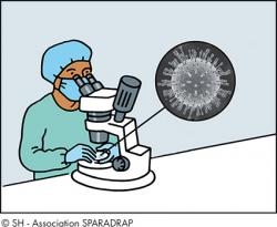 Un chercheur regarde un virus dans un microscope